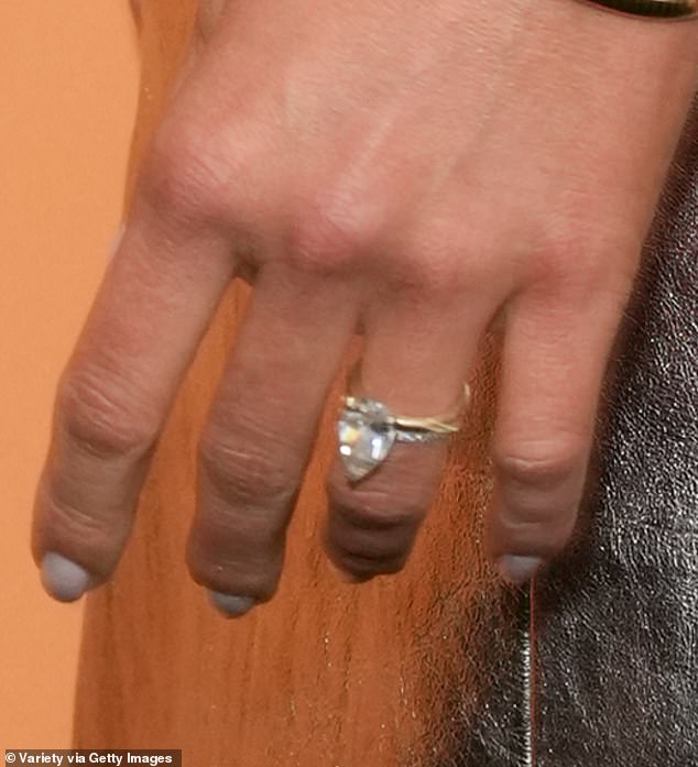 She showed off her diamond wedding ring from Yellowstone co-star Ryan Bingham, who she wed in 2023