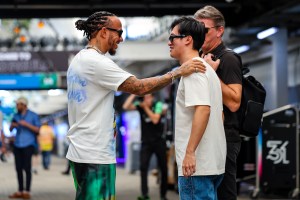 SAO PAULO, BRAZIL - OCTOBER 31: Lewis Hamilton of Great Britain and Mercedes speaks with Zhou Guanyu of China and Stake F1 Team Kick Sauber during previews ahead of the F1 Grand Prix of Brazil at Autodromo Jose Carlos Pace on October 31, 2024 in Sao Paulo, Brazil. (Photo by Kym Illman/Getty Images)