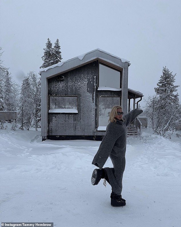 In photos shared to Instagram on Friday, Tammy posed in a grey jumper dress outside the cosy digs